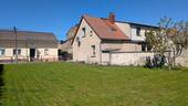 Ansicht Haus + Garten - Wo Generationen zusammenwachsen - ein Haus mit Geschichte und Zukunft