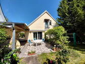 Garten mit Blick auf Terrasse - 8 Zimmer Einfamilienhaus zum Kaufen in Potsdam