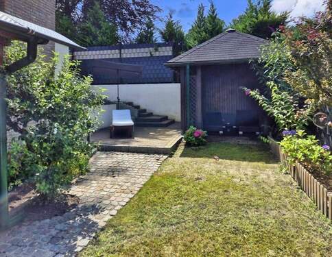 Gartenansicht - Einfamilienhaus mit 126,20 m² in Syke zum Kaufen