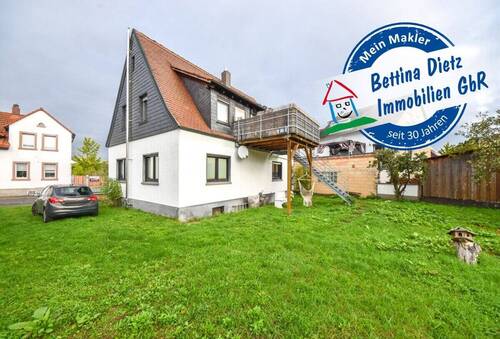 Außenansicht - DIETZ: 1-2 Familienhaus in ruhiger Großostheimer Wohnlage zu verkaufen! Erdgeschoss bereits frei!