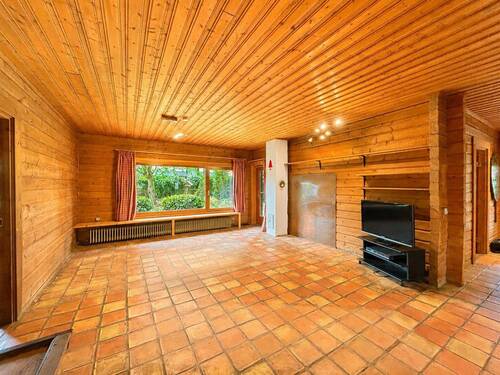 Wohnzimmer - 5 Zimmer Einfamilienhaus zum Kaufen in Hetlingen
