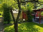 Garten und überdachte Terrasse - 
