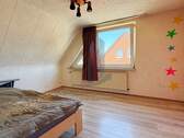 Das Schlafzimmer - Etagenwohnung mit 39,60 m² in Bramsche zum Kaufen