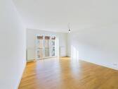 Beispiel Foto Wohnzimmer - 2 ZIMMERWOHNUNG - IN NACHHALTIG KERNSANIERTEM MEHRFAMILIENHAUS - ZUKUNFTSORIENTIERT