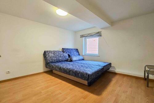 Schlafzimmer DG - Mehrfamilienhaus, Wohnhaus mit 190,00 m&sup2; in Groß-Zimmern zum Kaufen