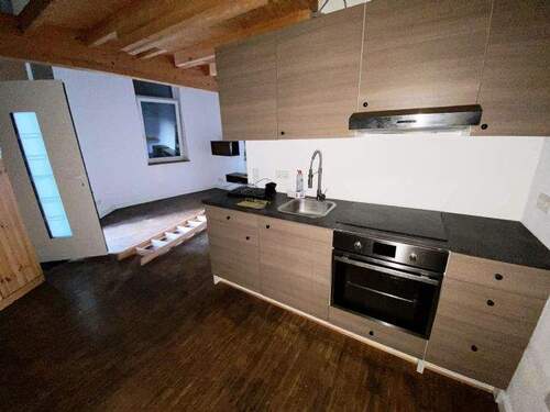 Bild 4 - 1-Zimmer-Erdgeschoss-Einliegerwohnung Einbauküche Fußbodenheizung ohne BalkonTerrasse