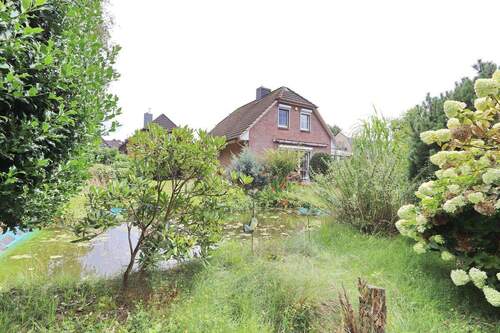 Haus und Teich - 