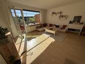 Wohnzimmer mit Balkon - 