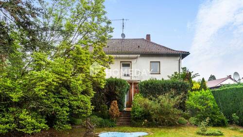 Außenansicht 1 - 7 Zimmer Einfamilienhaus zum Kaufen in Linkenheim-Hochstetten