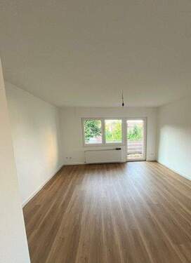 Wohnzimmer - Etagenwohnung mit 101,10 m² in Schloß Holte-Stukenbrock zur Miete