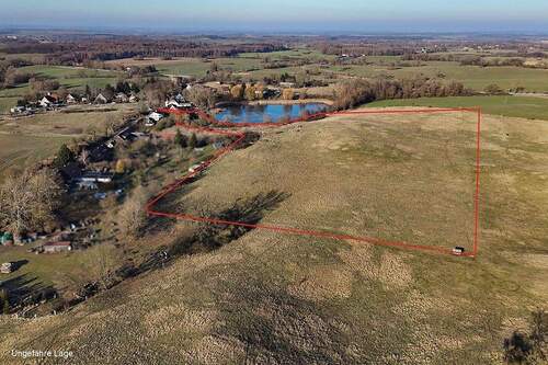 Luftaufnahme Rückansicht - Grundstück zum Kaufen in Möllenhagen