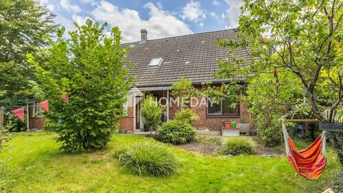 Außenansicht 1 - Charmantes Einfamilienhaus mit großem Garten & Ausbaupotenzial - perfekt für junge Familien!