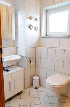 Badzimmer mit Waschmaschine - 