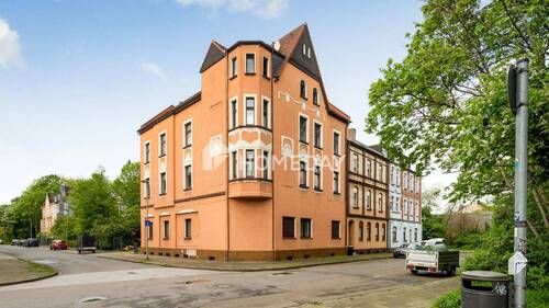 Außenansicht 2 - Investitionsimmobilie! Teilvermietetes MFH mit 6 WEs, Garten und Garage in ruhiger Lage