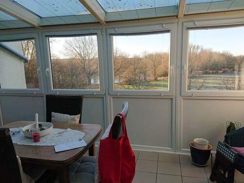 Blick vom Wohnzimmer in den Wintergarten - 