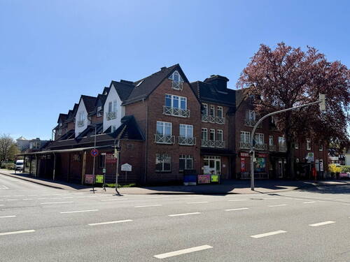 Hausansicht - Komplett modernisierte Eigentumswohnung mit Aufzug, Tiefgarage und Wallbox
