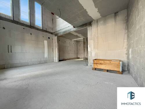 Wohnbereich mit Blick in die Küche - 