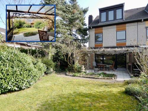 Rückansicht + Garten - Reihenendhaus mit Garten, überdachter Terrasse, Garage und durchdachten Grundrissen