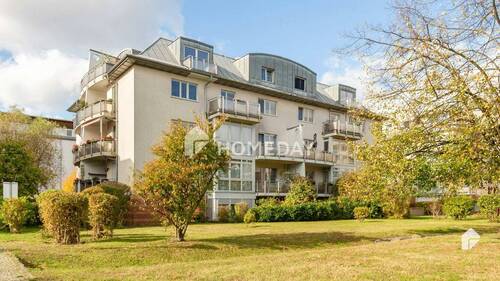 Außenansicht 2 - Charmante 2-Zimmer-Wohnung in ruhiger Lage mit zwei Balkonen und Tiefgaragenstellplatz