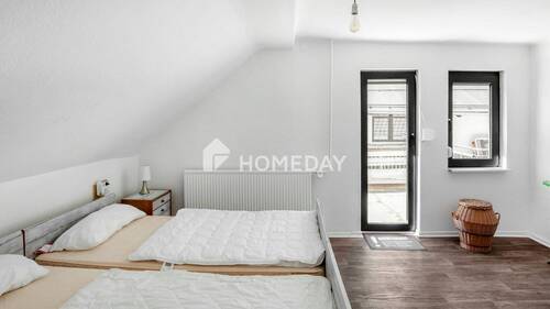 1. OG Schlafzimmer 1 - 