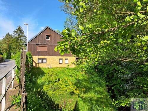Garten mit Bach - Einfamilienhaus mit 119,90 m² in Mittelherwigsdorf zum Kaufen