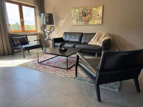 Wohnzimmer - Etagenwohnung mit 120,00 m&sup2; in Bad Camberg zum Kaufen