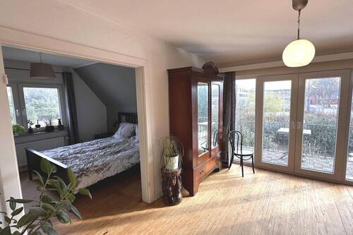 Schlafzimmer mit Balkon - 