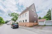 Hausansicht mit Garage - 9 Zimmer Mehrfamilienhaus, Wohnhaus zum Kaufen in Marl