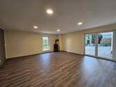 Wohnzimmer UG mit Kamin - 
