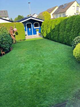 Blick in den Garten - Doppelhaushälfte mit 211,00 m² in Rodgau zum Kaufen