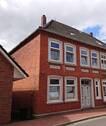 Vorder-/Seitenansicht - 4 Zimmer Mehrfamilienhaus, Wohnhaus zum Kaufen in Wilster