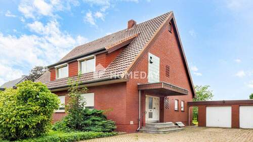 Außenansicht 1 - Großzügiges Einfamilienhaus mit Wintergarten, großem Garten und vielfältigen Nutzungsmöglichkeiten