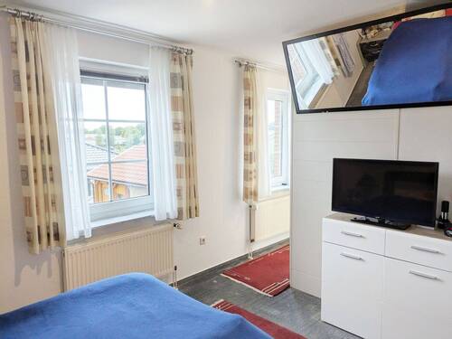 Schlafzimmer mit Ankleidebereich - 