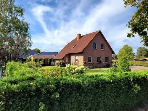 Fehnhaus mit Nebengebäude - 5 Zimmer Einfamilienhaus zum Kaufen in Filsum