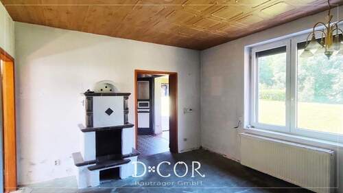 Wohnzimmer Erdgeschoss mit Kamin - 