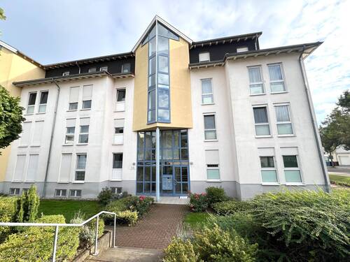 Hausansicht - Top-Gelegenheit! Schöne 3 Zimmer Eigentumswohnung mit Tiefgaragenplatz in Winzenheim zu verkaufen.