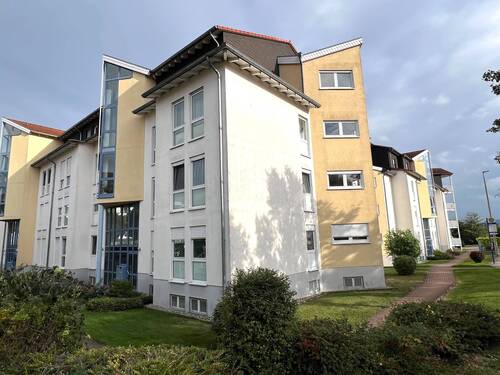 Seitenansicht - Etagenwohnung mit 79,80 m² in Bad Kreuznach-Winzenheim zum Kaufen