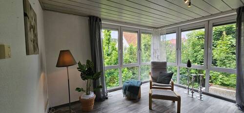 Wohnzimmer zum Garten.jpg - Mehrfamilienhaus, Wohnhaus mit 157,00 m&sup2; in Lauda-Königshofen zum Kaufen