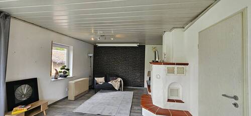 Wohnzimmer mit Ofen.jpg - 