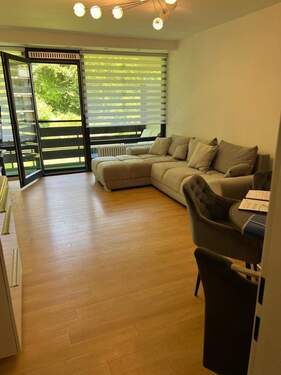 Wohnbereich m. Zugang z. Balkon - Helle und moderne 3-Zimmer-Wohnung mit Wohlfühlcharakter