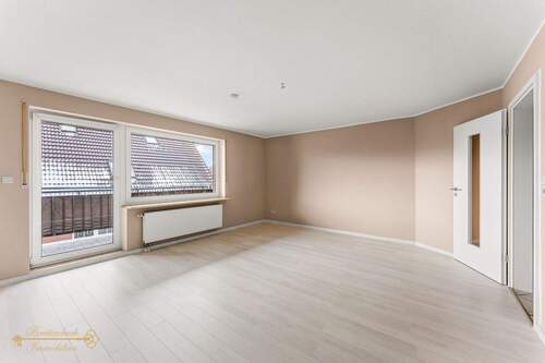 Wohnzimmer - Etagenwohnung mit 85,00 m&sup2; in Butjadingen zum Kaufen