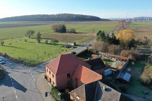 Drohnenaufnahme Umgebung - Mehrfamilienhaus, Wohnhaus mit 180,00 m&sup2; in Springe zum Kaufen