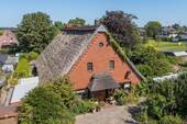 Luftbild - 8 Zimmer Mehrfamilienhaus, Wohnhaus zum Kaufen in Lemwerder