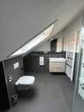 Bad - Moderne 3-Zimmer-Dachgeschosswohnung mit Balkon