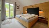 Schlafzimmer mit Blick ins Grüne - 