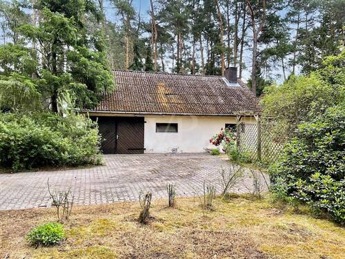 Blick zur Garage - Einfamilienhaus mit 106,00 m² in Gorleben zum Kaufen