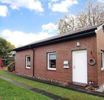 Maritimes Lebensgefühl trifft Komfort: Tolles Einfamilienhaus mit Gartenliebe in Friedrichskoog