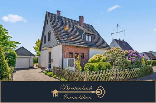 Hausansicht - Ihr neues Zuhause mit Charme, Kamin und liebevoll gestaltetem Garten