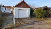 Garage und Carport auf der Rückseite - 