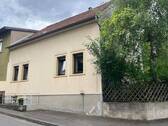 Hausansicht mit Eingang zum Gewölbekeller - Einfamilienhaus mit 130,00 m&sup2; in Feilbingert zum Kaufen